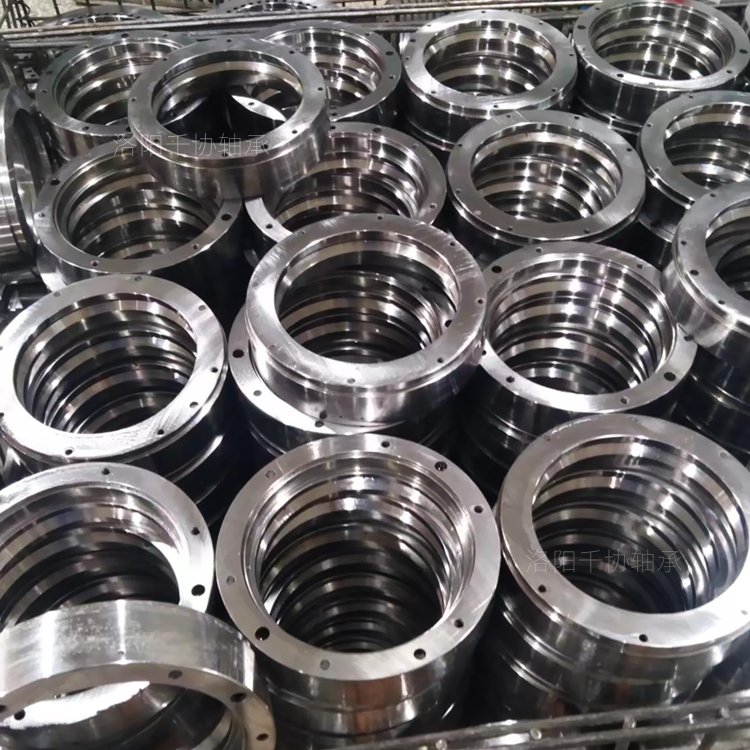 总结哪些原因会使转盘轴承过热，那么处理方法是什么？